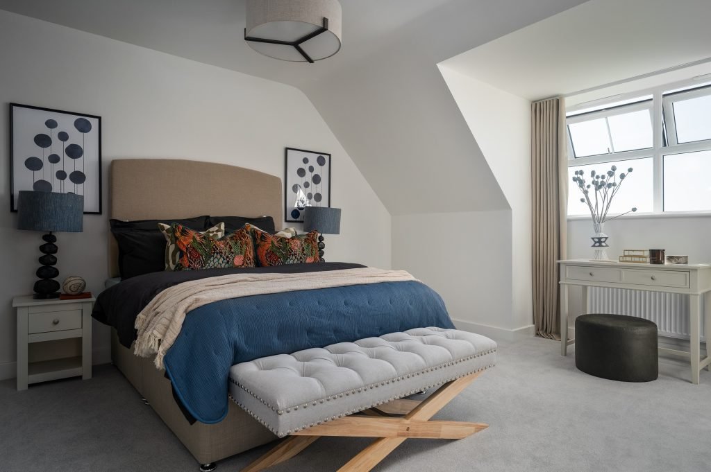 Tour the Foxes Chase home in East Riding Yorkshire showcasing an open-plan living area, designer kitchen with island, statement furniture, and stylish finishes.