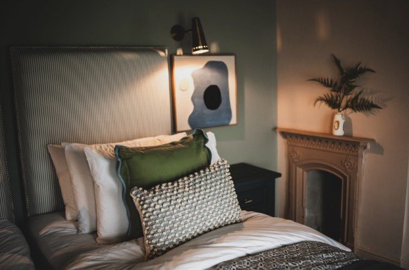 Bedroom with shades of green.